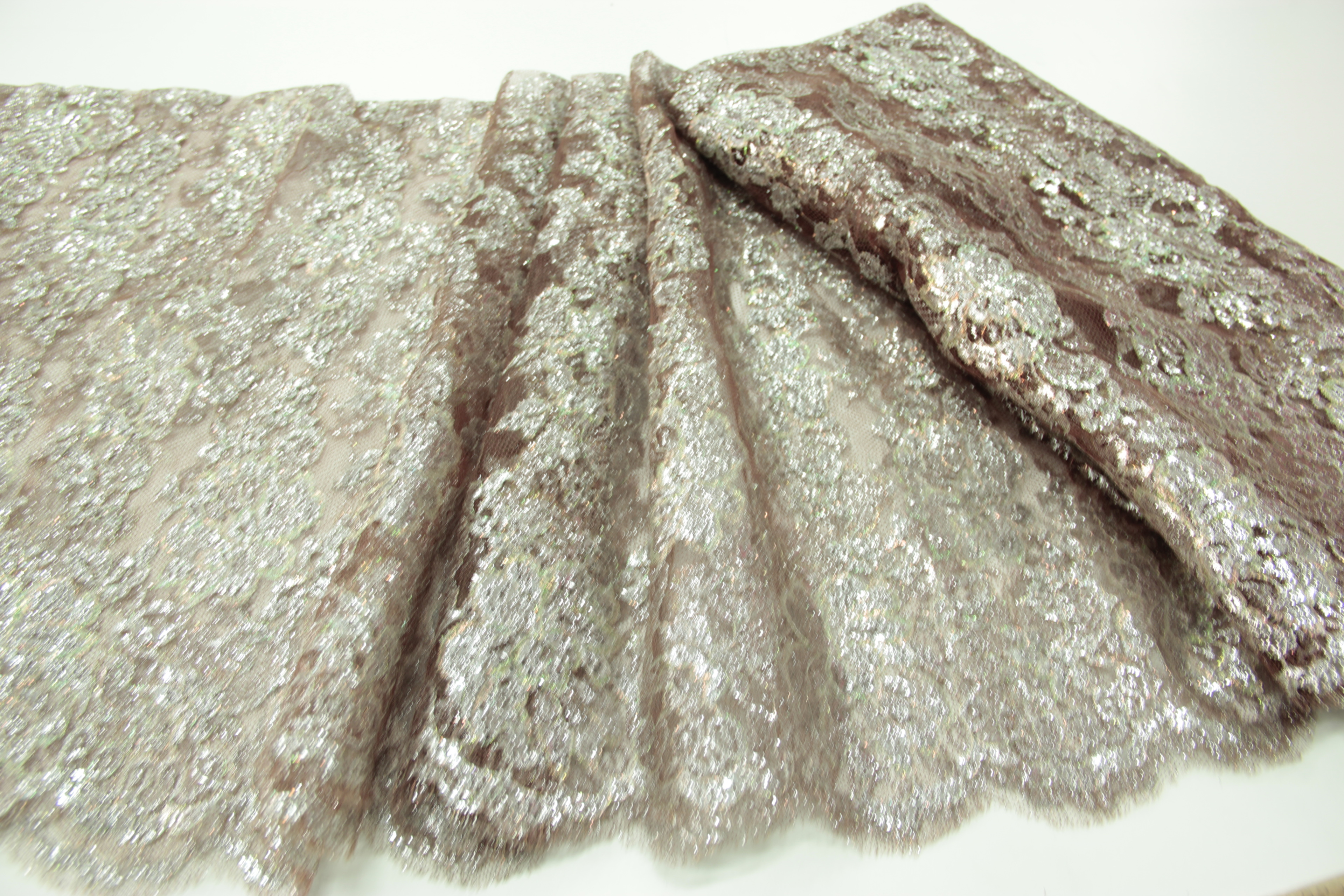 Haute couture gold Chantilly lace, France, $98/yd