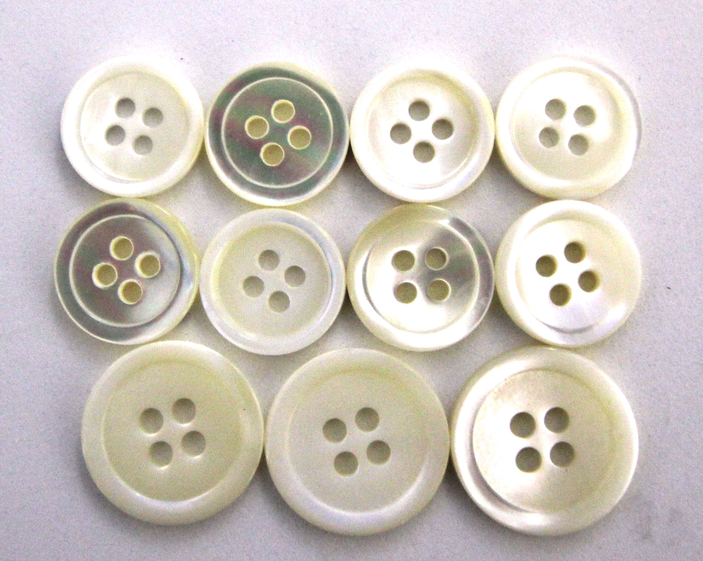 Mother of pearl 4 hole rimmed buttons